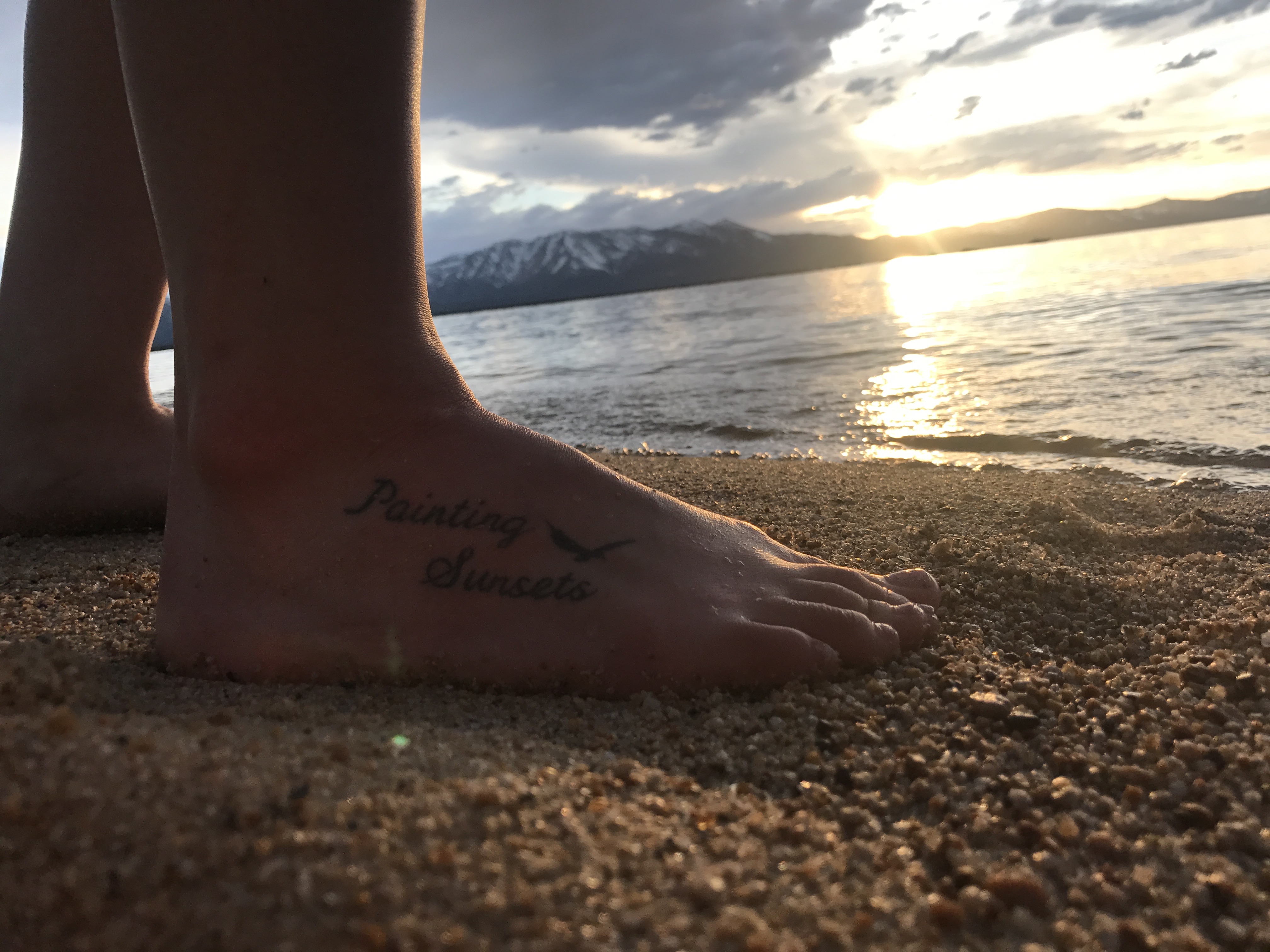 Tattoo "Painting Sunsets" in memory of my mom.