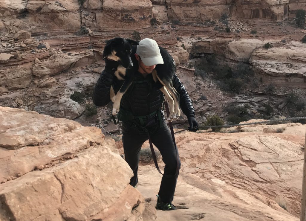 Hiking in Utah to see Corona Arch.