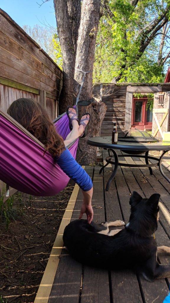 Hanging out in a hammock in our backyard on a beautiful day in Tulsa.