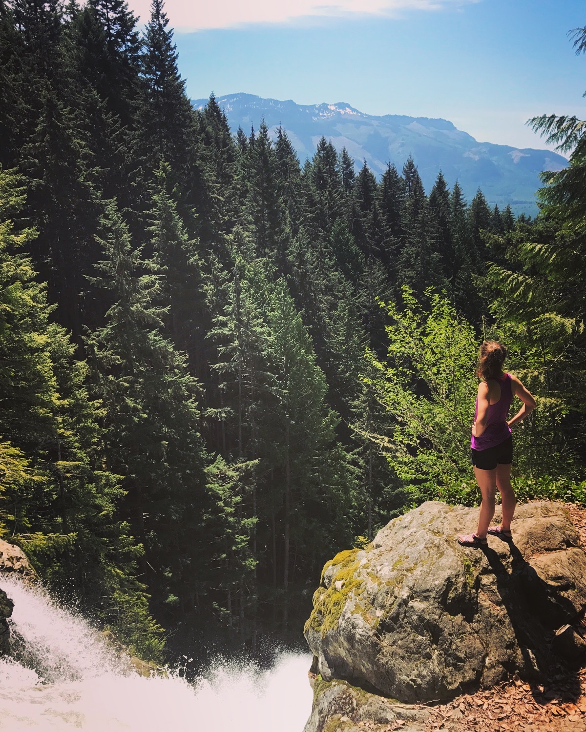 Hiking at a waterfall in Washington.