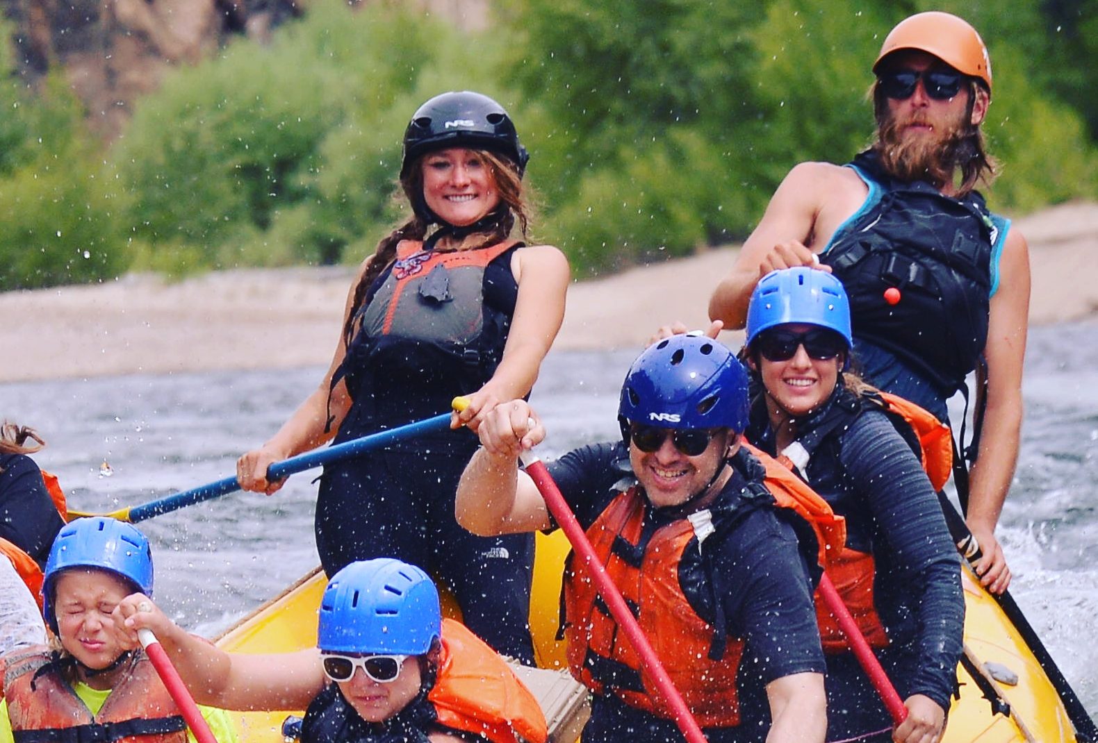 Adventure guides rafting on the Arkansas River in Colorado.