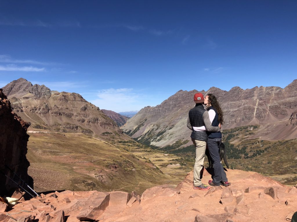 Couple hiking and backbacking Four Pass Loop in Colorado.